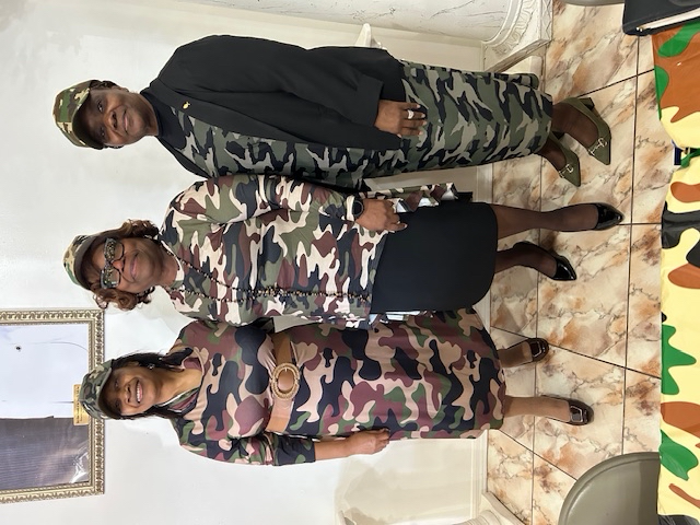 Three women in camouflage