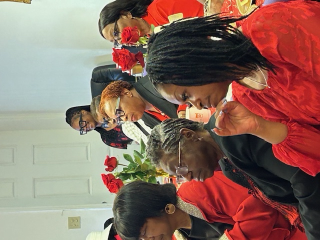 Women in red at event