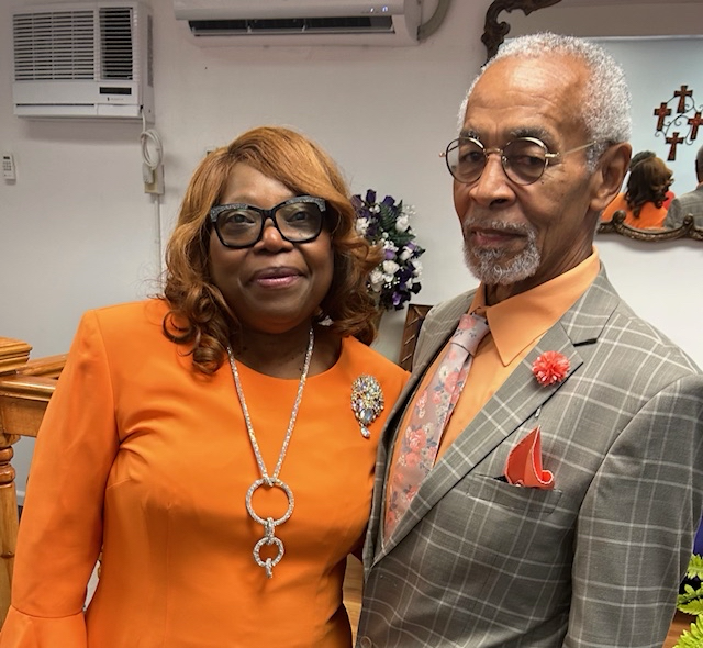 Couple in orange and gray